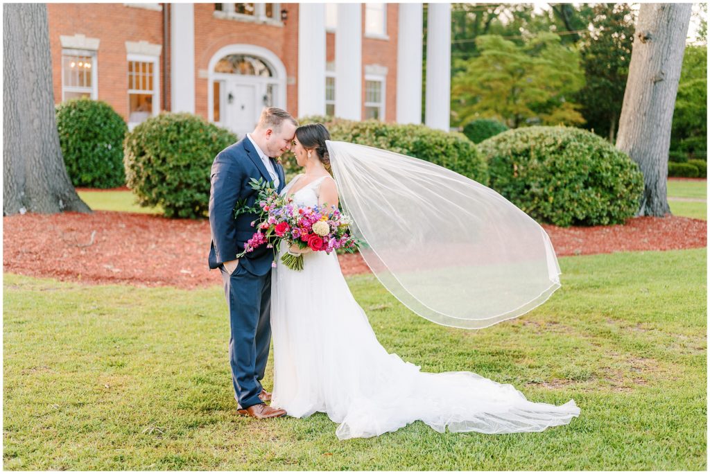 The Machaven Rocky Mount NC Bride and Groom Veil Toss Photo