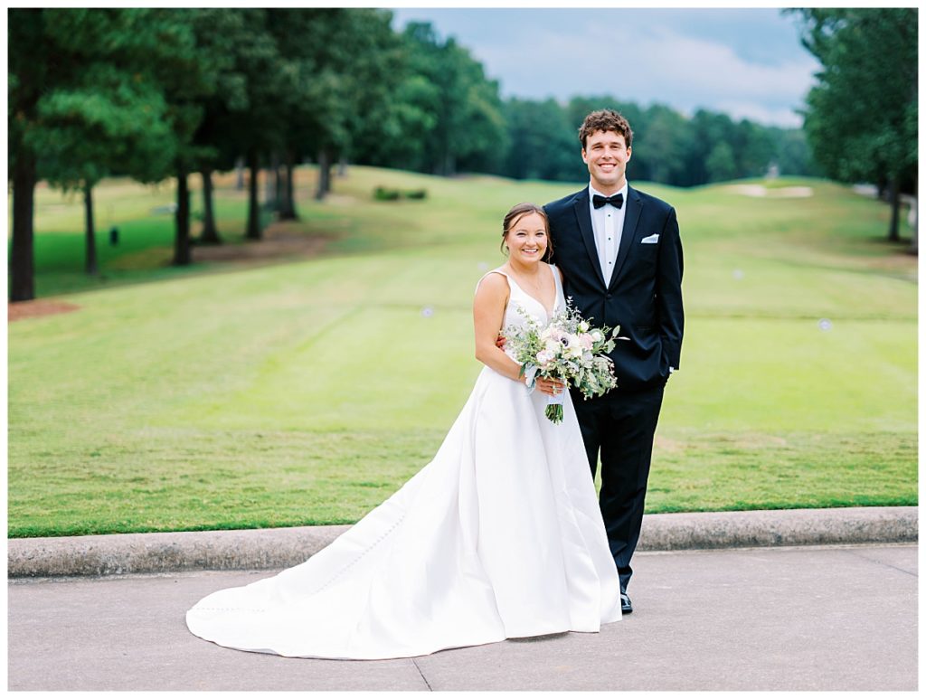 bride and groom sharing a first look at the chapel hill country club