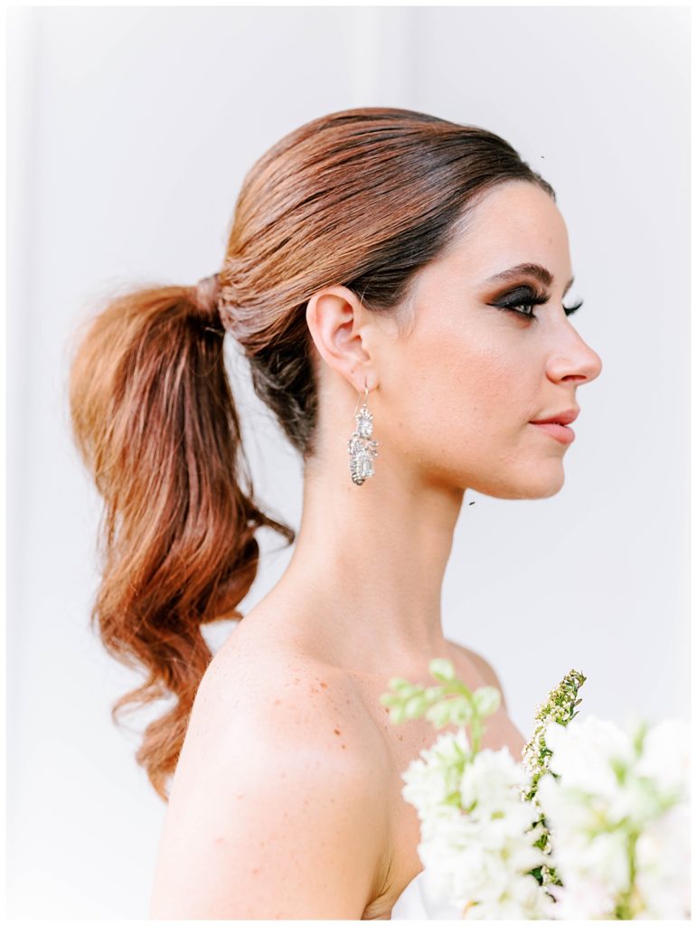 bride side profile and earring accessory at the Distillery in North Carolina
