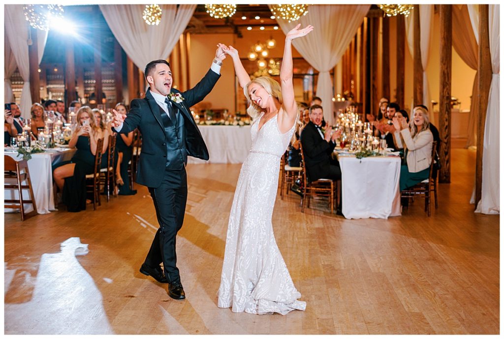 bride and groom dancing during reception at the cotton room