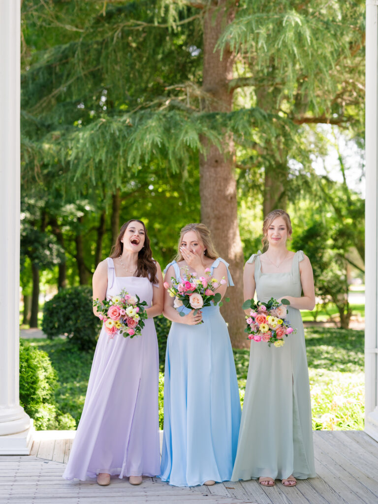First look with bridesmaids at wedding at Rose Hill Estate