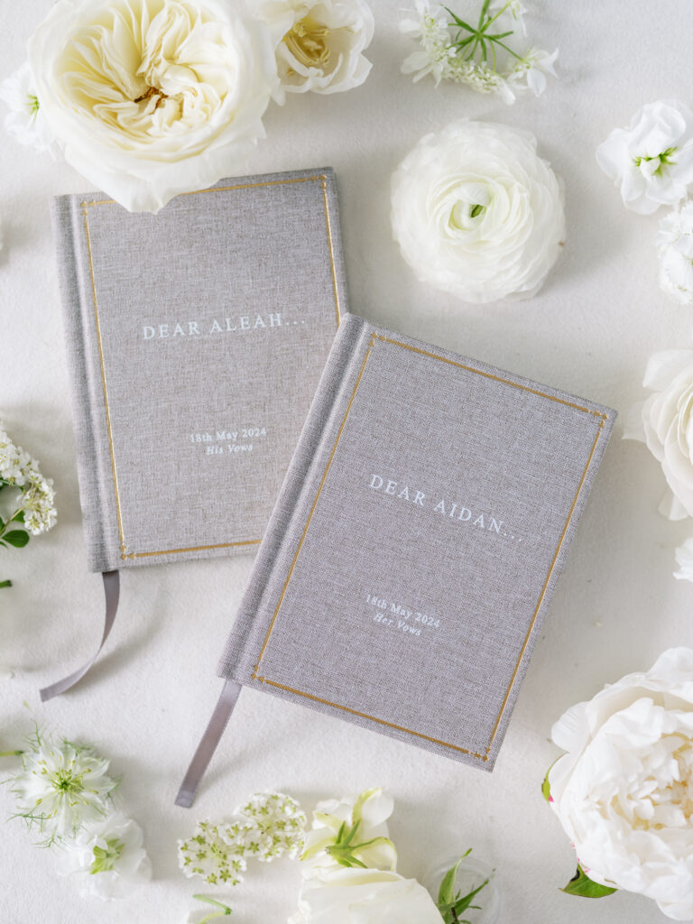 Custom grey vow books for couple on their wedding day